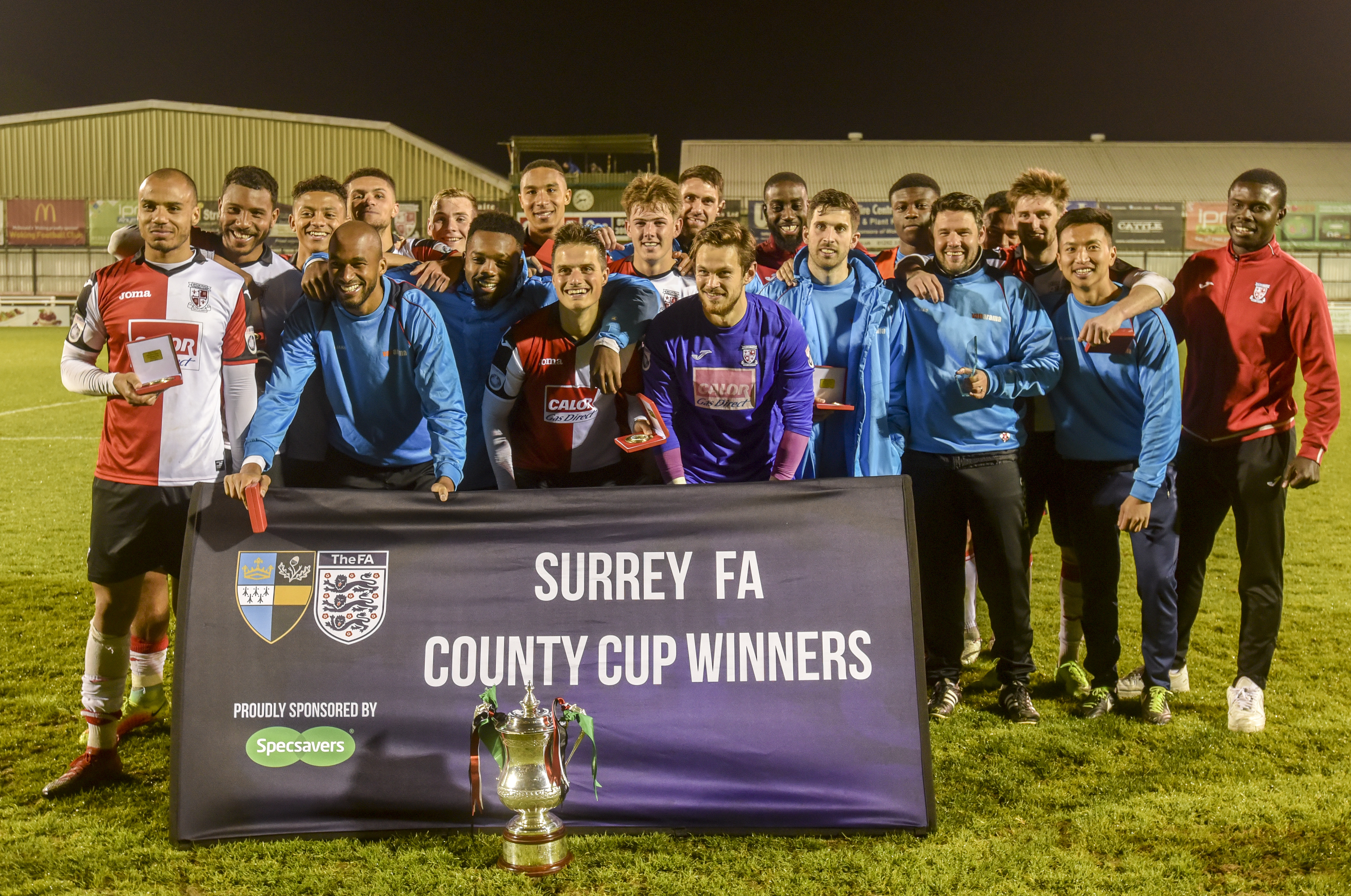 Harrison as part of the coaching staff after winning the Surrey Senior Cup